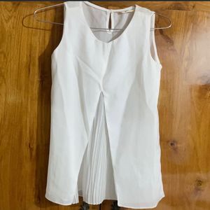 white  sleeveless top