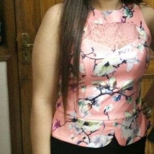 Sleeveless Crop Top In peplum Style