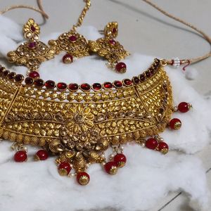 Heavy Golden And Red Kundan With Pearl Set