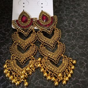 Beautiful red golden colour long jhumka earrings