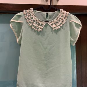 Pastel green top