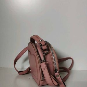 cute and pinteresty peach colour sling bag