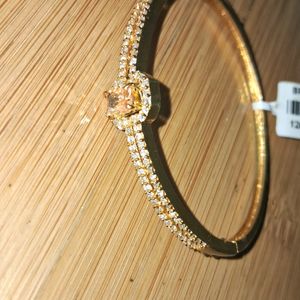 New bracelet gold shine unused