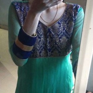 long green anarkali set  with its salwar and net  dupatta