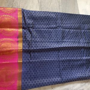 A Pattu Navy Blue nd Pink Coloured Saree.