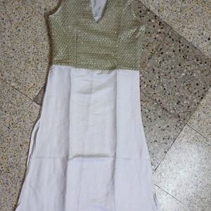 Raw silk designer kurti  with chinies caller with bottom border of 4 inch