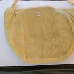 golden designer beaded purse