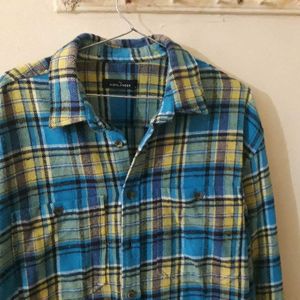 "Checkered Charm: The Ultimate Casual Shirt"