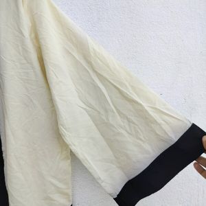 Corian Thrifted Shrug