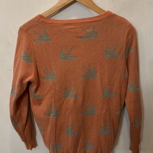 Orange Sweater With Silver Bird Print