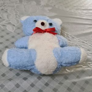 Sky Blue Teddy Bear with Red bow...a Stuffed Toy