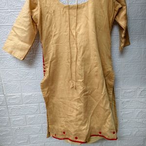 Golden Kurti With Red Embroidery