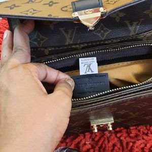 LOUIS VUITTON SLING BAG