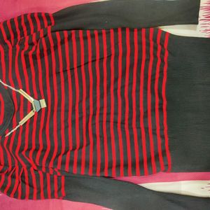 A Red And Black Stretchable Top Of Size L Which ca