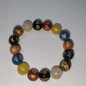 Om Mani Seven Chakra Round Bead Bracelet.