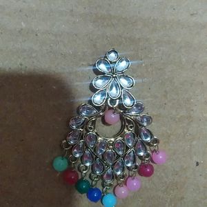 Beautiful ear rings multi colored with stones and gold polish