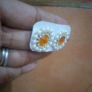 Kundan Studs In Orange Colour