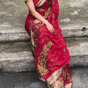 Red saree with golden zari work