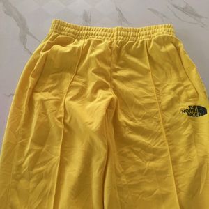 NORTH FACE YELLOW LOWER TRACKPANT