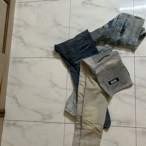 Three Pairs Of Jeans With Different Styles