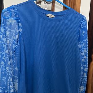 And Blue Top With Puffed Sleeves