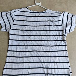 Woman's White Top With Black Strips