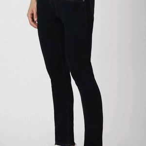 VAN HEUSEN Mid-Rise Slim Fit Jeans.