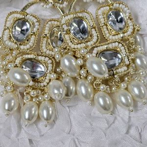 Trending Golden Earrings with Pearls.