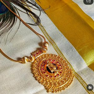 Gold Plated Midlength Chain Of Krishna Pendent