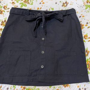 Mini Skirt With Button Detailing.