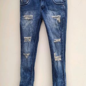 Women Ripped Faded Blue Jeans