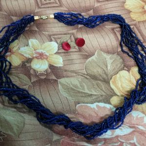 Blue Necklace And Red Velvet Earings.