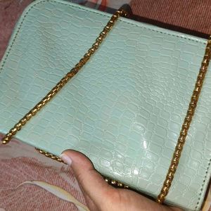 Mint green sling bag