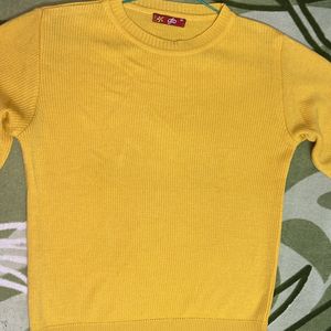 yellow sweater