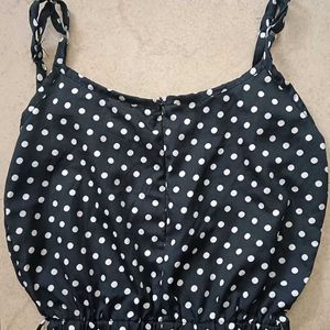 A Black Polka Dot Jumpsuit