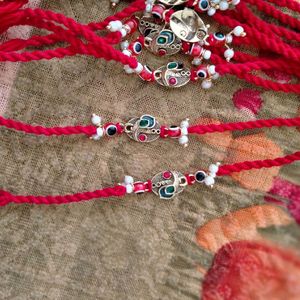 RAKHI with Morpankh, Red Evil Eye & Pearls