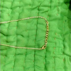 Golden chain with a Pretty bow Pendant