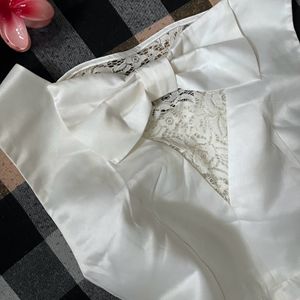 Pretty White Dress With Back Bow Design