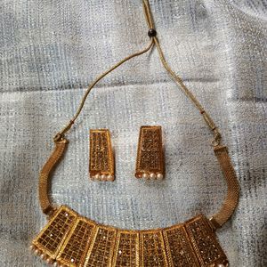 Golden Necklace And Earrings