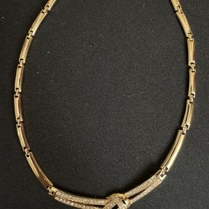 Necklace in yellow gold Plated with diamonds