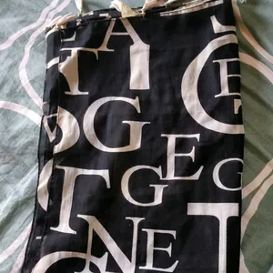 Black Scarf With White Print Of Alphabets