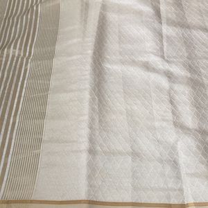 New Off White Golden Zari Saree For Grabs