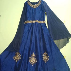 Festive Gown With Extended Cape Sleeves