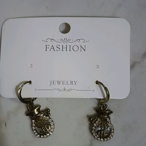 A Dollar Sign Earrings Pair , Very Stylish