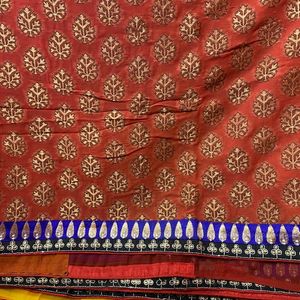 YELLOW ORANGE SHIFFON AND HEAVY EMBROIDERY SAREE