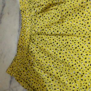 Sale 💯 💯 💯 💯 💯 💯 💯.                       Long Yellow Printed Black And White Skirt