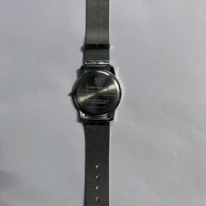 slim metallic watch