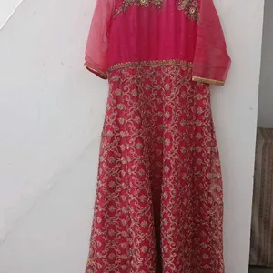 A Magenta Gown With Beautiful Heavy Zaari Work