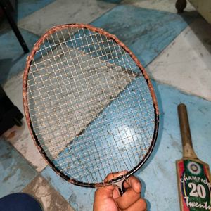 combo cricket bat and badminton racket old