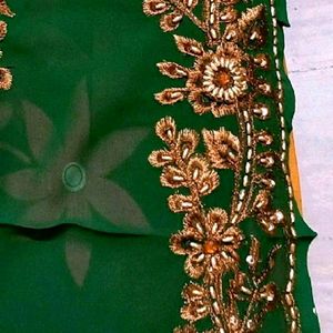 green heavy stone work saree